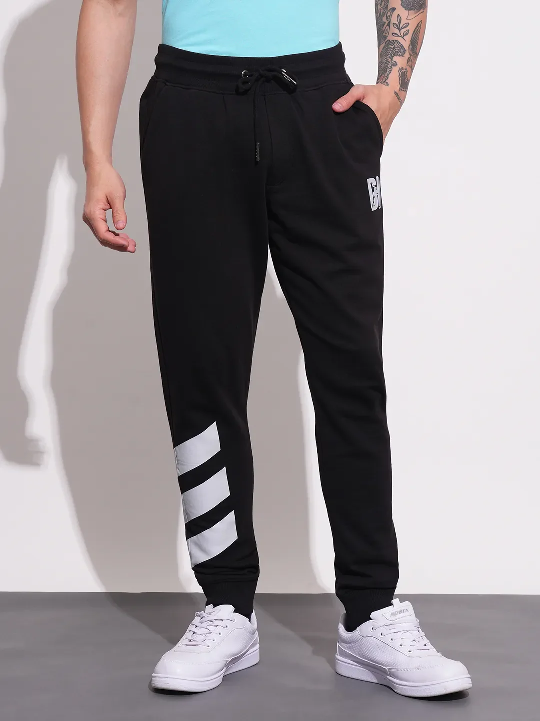 Black Regular fit Men's Track Pants by Being Human Clothing